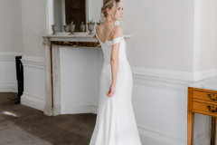 A bride wearing a simple, modern dress on her wedding day in London. 